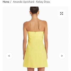 Fun resort, spring or summer strapless dress. With pockets. Length is perfect.